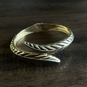 Gold-Tone Bangle Bracelet with Leaf-Like Detailing
